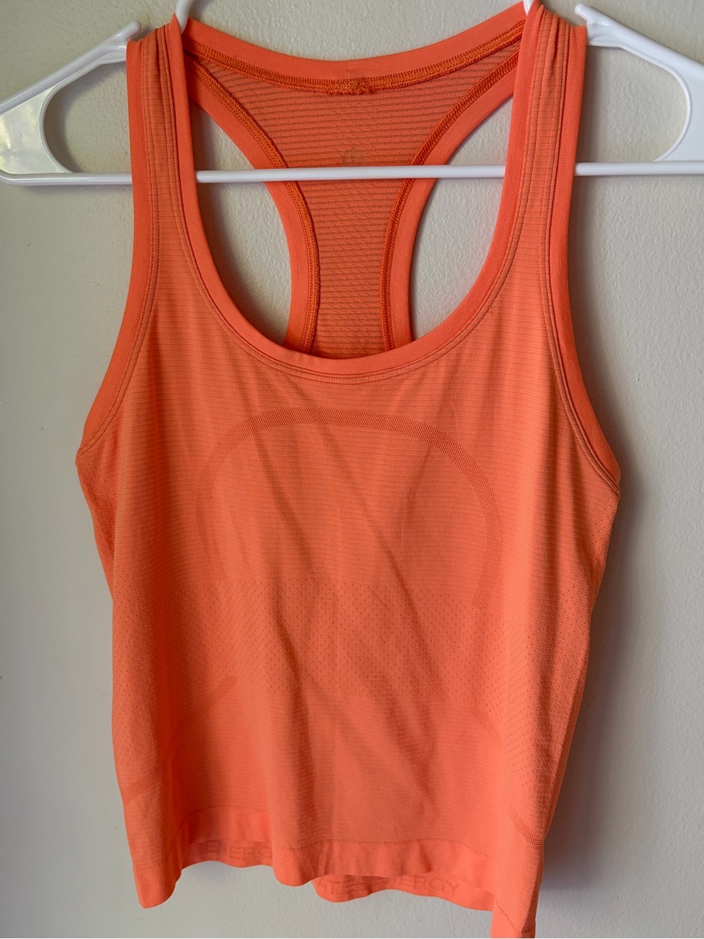 29. Size 4 LULULEMON Orange Race Length Swiftly Tank
